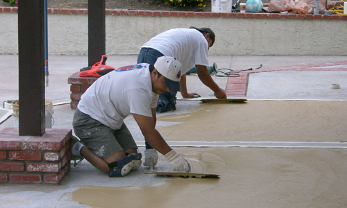 Photo showing application of Krete Kote Concrete Overlay